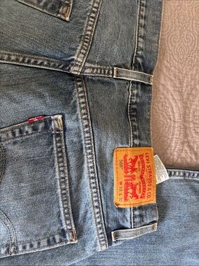 Levi's 569 Relaxed Men's Jeans in Light Blue Denim with Leather Patch